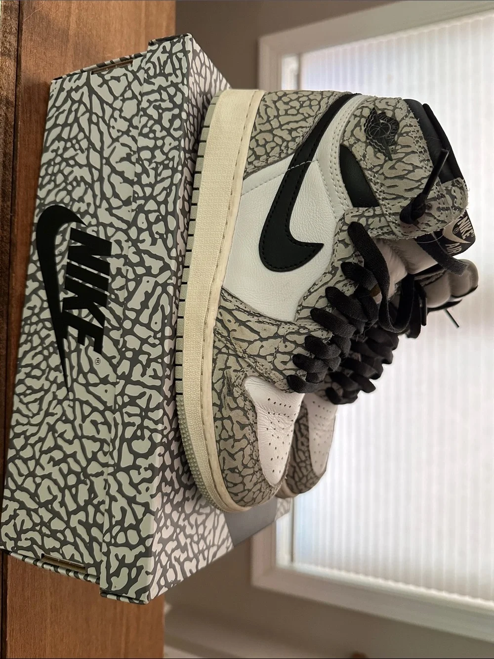 Nike Jordan High-Top Sneakers in White, Black, Grey Elephant Print